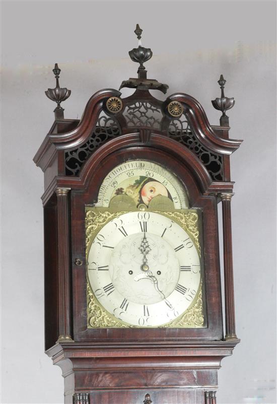 Major Scholfield of Manchester. An early 19th century flame mahogany cased eight day longcase clock, 8ft 6in.